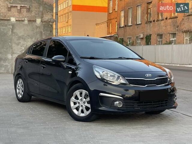 Чорний Кіа Ріо, об'ємом двигуна 1.4 л та пробігом 95 тис. км за 8999 $, фото 6 на Automoto.ua