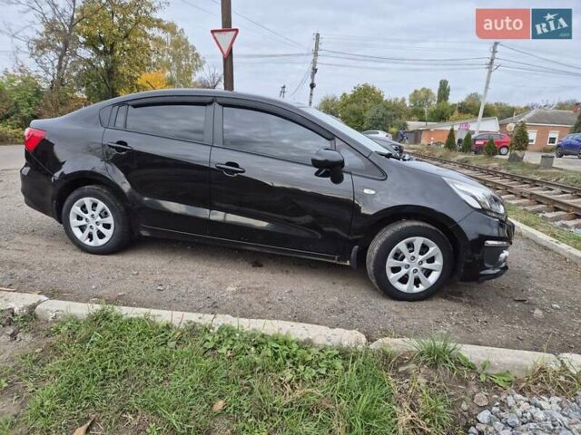 Черный Киа Рио, объемом двигателя 1.4 л и пробегом 115 тыс. км за 9400 $, фото 13 на Automoto.ua