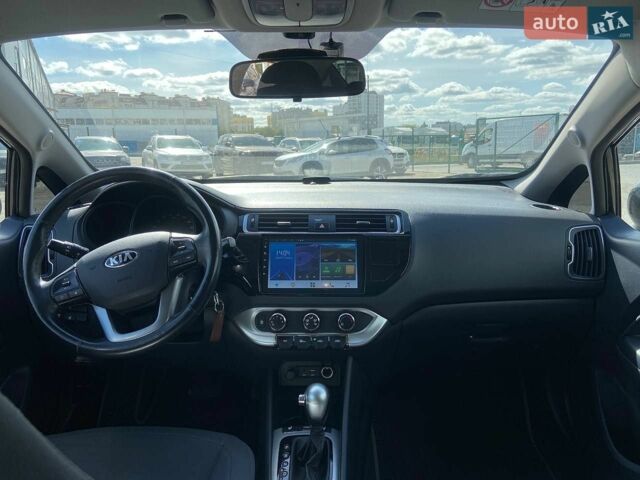 Чорний Кіа Ріо, об'ємом двигуна 1.4 л та пробігом 80 тис. км за 12300 $, фото 6 на Automoto.ua
