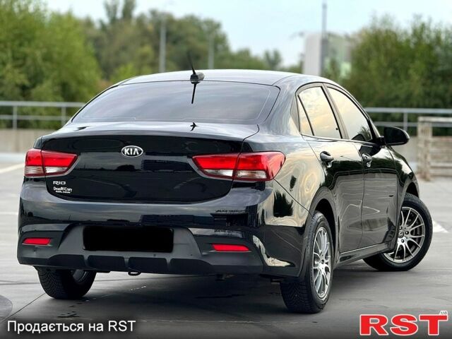 Черный Киа Рио, объемом двигателя 16 л и пробегом 128 тыс. км за 11900 $, фото 6 на Automoto.ua