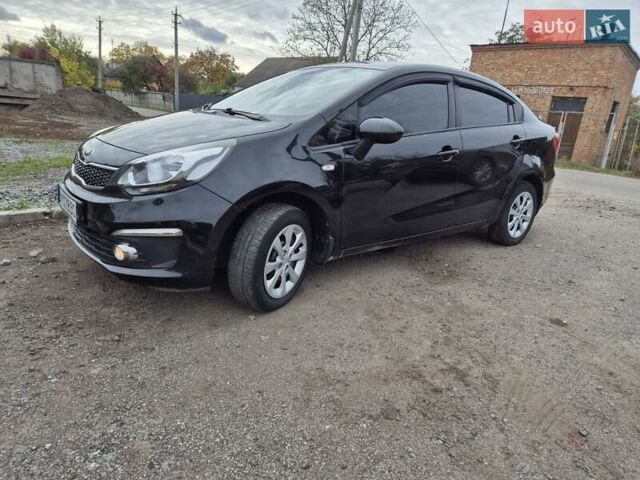 Черный Киа Рио, объемом двигателя 1.4 л и пробегом 115 тыс. км за 9400 $, фото 12 на Automoto.ua