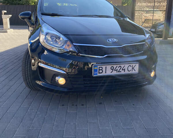 Черный Киа Рио, объемом двигателя 1.4 л и пробегом 14 тыс. км за 11999 $, фото 1 на Automoto.ua
