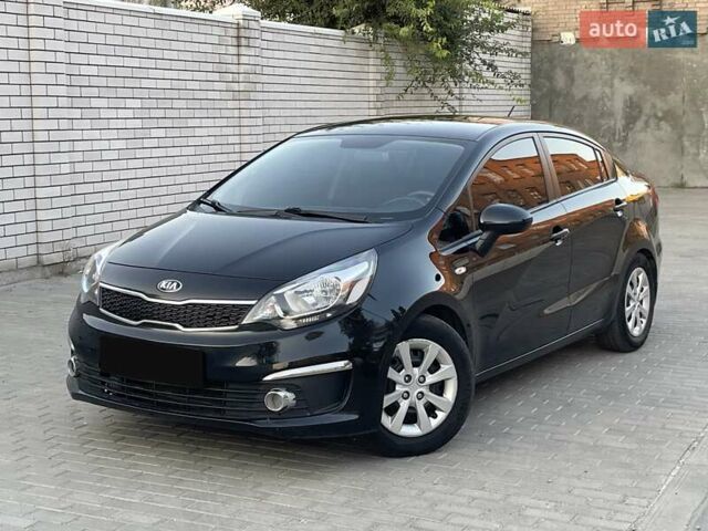 Чорний Кіа Ріо, об'ємом двигуна 1.4 л та пробігом 95 тис. км за 8999 $, фото 5 на Automoto.ua