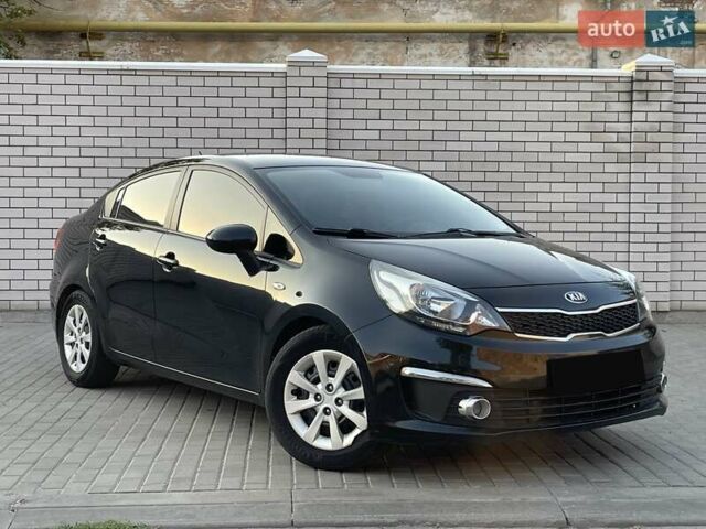 Чорний Кіа Ріо, об'ємом двигуна 1.4 л та пробігом 95 тис. км за 8999 $, фото 2 на Automoto.ua