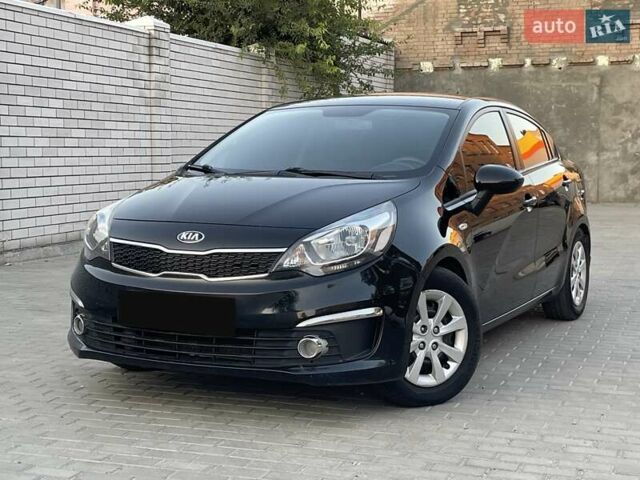 Чорний Кіа Ріо, об'ємом двигуна 1.4 л та пробігом 95 тис. км за 8999 $, фото 1 на Automoto.ua