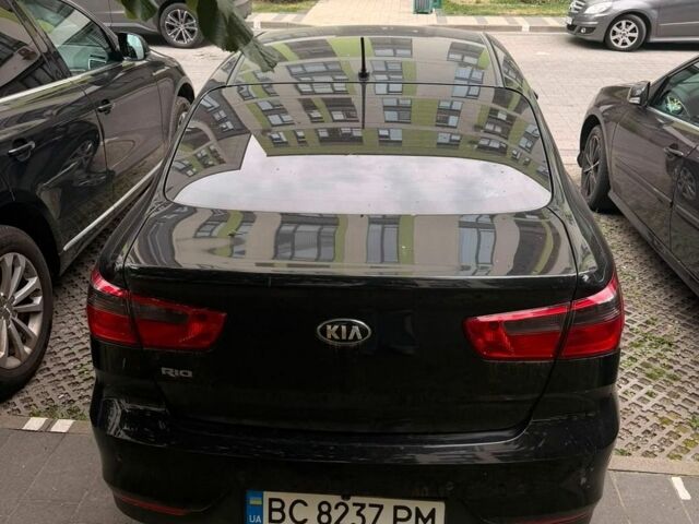 Чорний Кіа Ріо, об'ємом двигуна 1.4 л та пробігом 79 тис. км за 11500 $, фото 1 на Automoto.ua