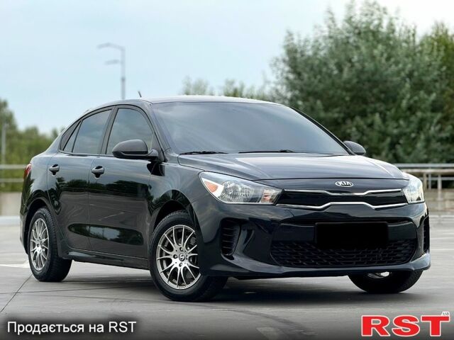 Черный Киа Рио, объемом двигателя 16 л и пробегом 128 тыс. км за 11900 $, фото 2 на Automoto.ua
