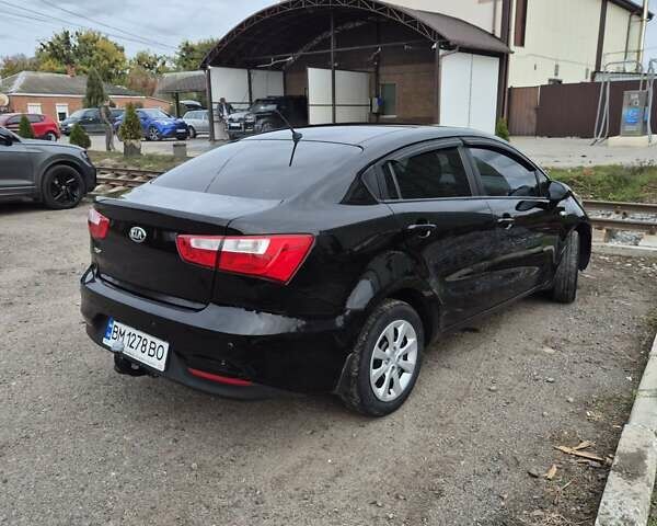 Черный Киа Рио, объемом двигателя 1.4 л и пробегом 115 тыс. км за 9400 $, фото 3 на Automoto.ua