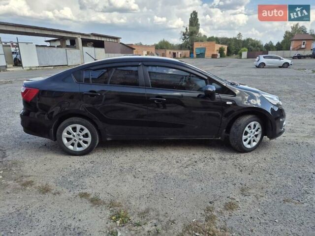 Черный Киа Рио, объемом двигателя 1.4 л и пробегом 115 тыс. км за 9500 $, фото 1 на Automoto.ua