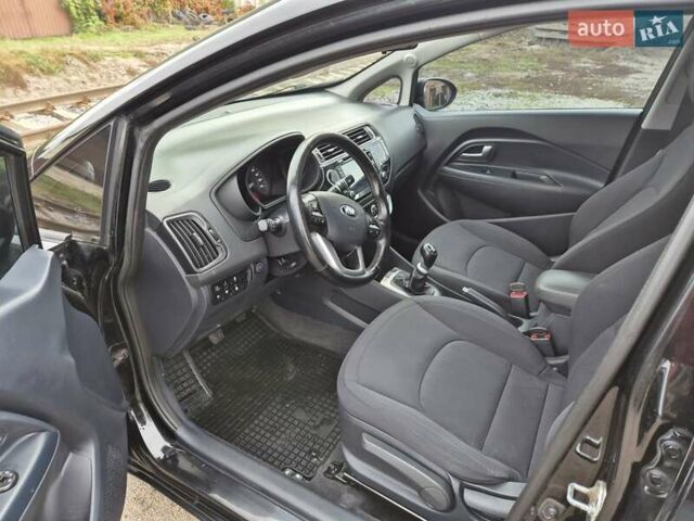 Черный Киа Рио, объемом двигателя 1.4 л и пробегом 115 тыс. км за 9400 $, фото 7 на Automoto.ua