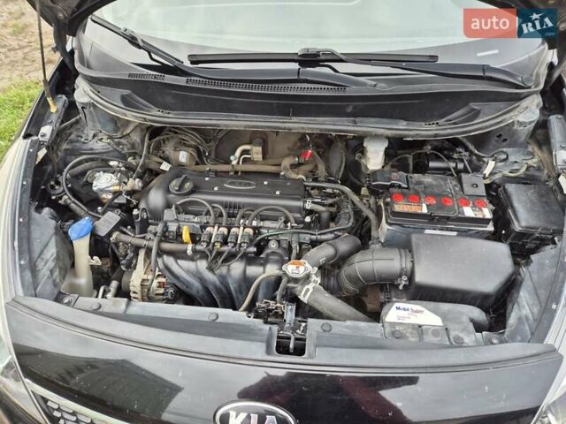Черный Киа Рио, объемом двигателя 1.4 л и пробегом 115 тыс. км за 9400 $, фото 14 на Automoto.ua