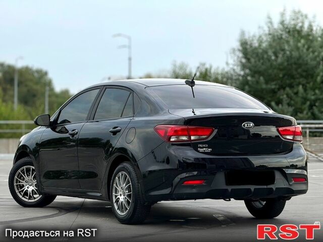 Черный Киа Рио, объемом двигателя 16 л и пробегом 128 тыс. км за 11900 $, фото 5 на Automoto.ua