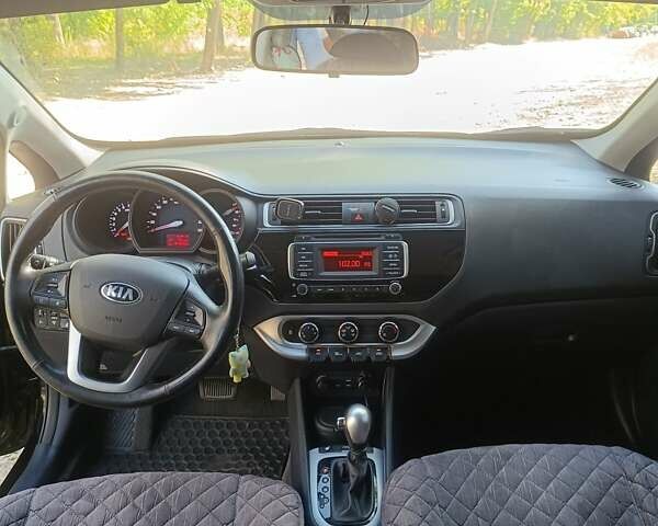 Чорний Кіа Ріо, об'ємом двигуна 1.4 л та пробігом 85 тис. км за 12500 $, фото 5 на Automoto.ua