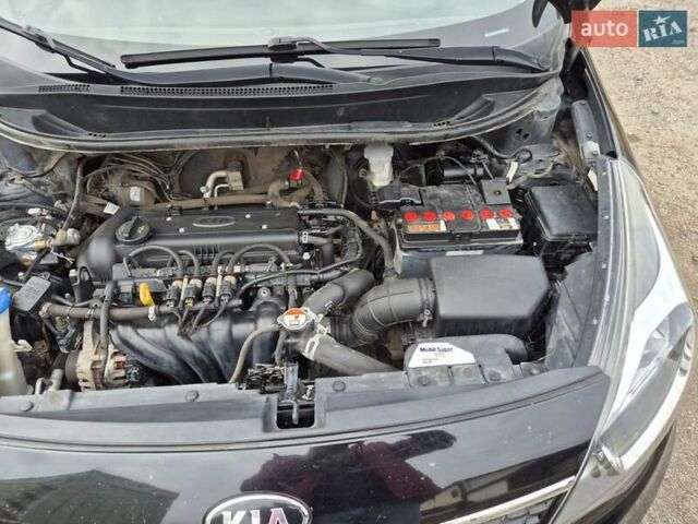Черный Киа Рио, объемом двигателя 1.4 л и пробегом 115 тыс. км за 9400 $, фото 15 на Automoto.ua
