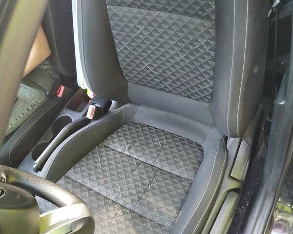Черный Киа Рио, объемом двигателя 1.59 л и пробегом 88 тыс. км за 9500 $, фото 6 на Automoto.ua