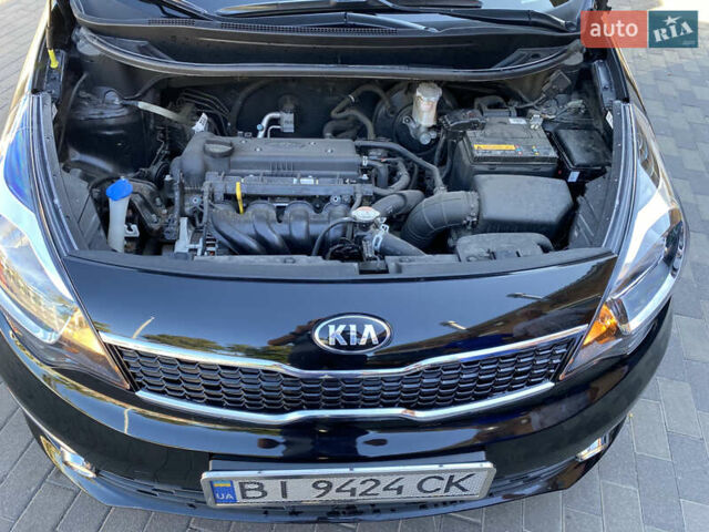 Черный Киа Рио, объемом двигателя 1.4 л и пробегом 14 тыс. км за 11999 $, фото 9 на Automoto.ua