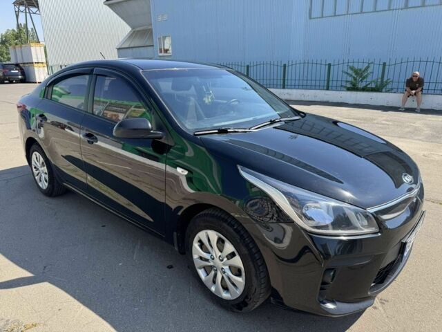 Чорний Кіа Ріо, об'ємом двигуна 1 л та пробігом 156 тис. км за 11028 $, фото 5 на Automoto.ua