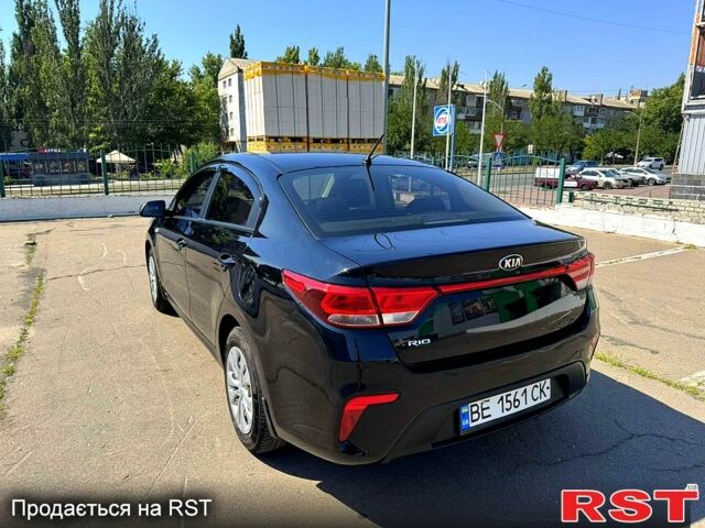 Чорний Кіа Ріо, об'ємом двигуна 1.4 л та пробігом 145 тис. км за 11500 $, фото 2 на Automoto.ua