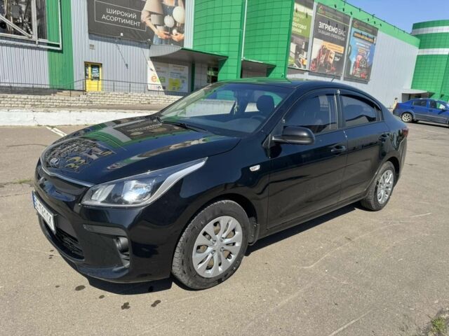 Чорний Кіа Ріо, об'ємом двигуна 1 л та пробігом 156 тис. км за 11028 $, фото 4 на Automoto.ua