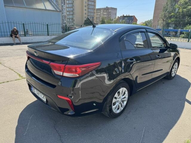 Чорний Кіа Ріо, об'ємом двигуна 1 л та пробігом 156 тис. км за 11028 $, фото 3 на Automoto.ua