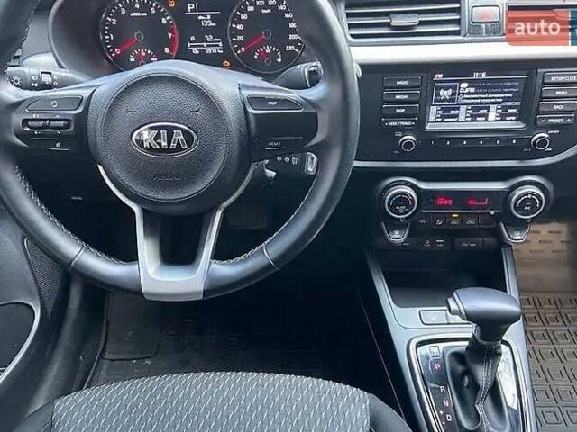 Чорний Кіа Ріо, об'ємом двигуна 1.59 л та пробігом 150 тис. км за 12500 $, фото 5 на Automoto.ua