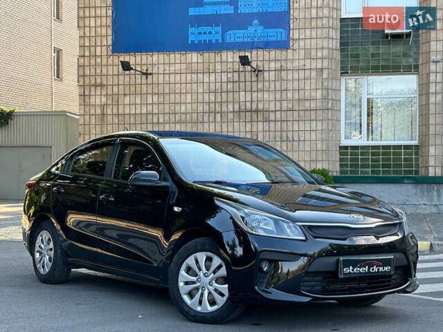 Черный Киа Рио, объемом двигателя 1.37 л и пробегом 127 тыс. км за 11899 $, фото 2 на Automoto.ua