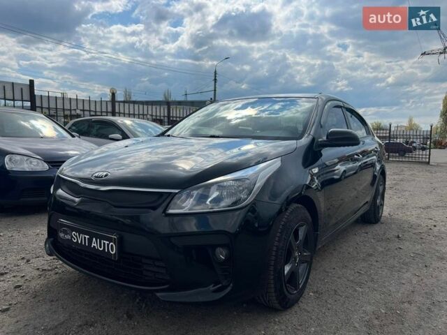 Черный Киа Рио, объемом двигателя 1.37 л и пробегом 145 тыс. км за 12500 $, фото 1 на Automoto.ua