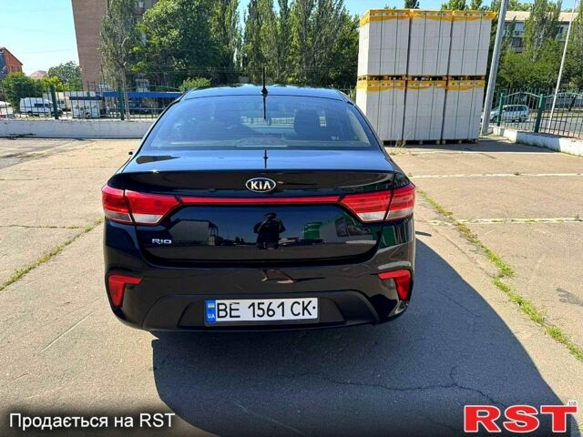 Чорний Кіа Ріо, об'ємом двигуна 1.4 л та пробігом 145 тис. км за 11500 $, фото 4 на Automoto.ua