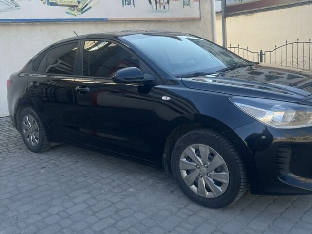 Чорний Кіа Ріо, об'ємом двигуна 1.6 л та пробігом 89 тис. км за 11400 $, фото 2 на Automoto.ua
