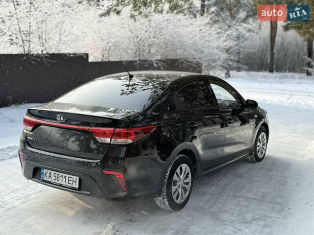 Чорний Кіа Ріо, об'ємом двигуна 1.37 л та пробігом 66 тис. км за 14300 $, фото 5 на Automoto.ua
