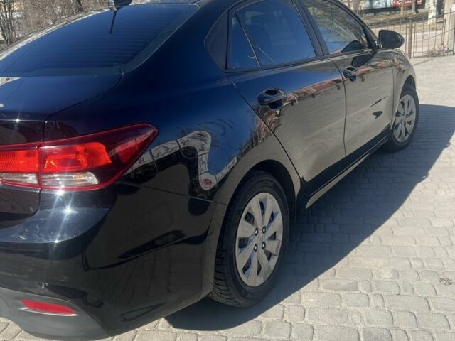 Чорний Кіа Ріо, об'ємом двигуна 1.6 л та пробігом 89 тис. км за 11400 $, фото 9 на Automoto.ua