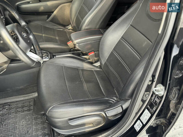 Чорний Кіа Ріо, об'ємом двигуна 1.37 л та пробігом 66 тис. км за 14500 $, фото 8 на Automoto.ua