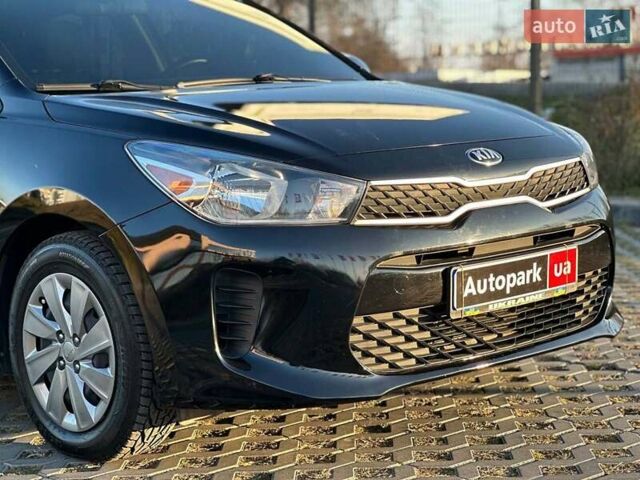 Чорний Кіа Ріо, об'ємом двигуна 1.6 л та пробігом 74 тис. км за 11790 $, фото 8 на Automoto.ua