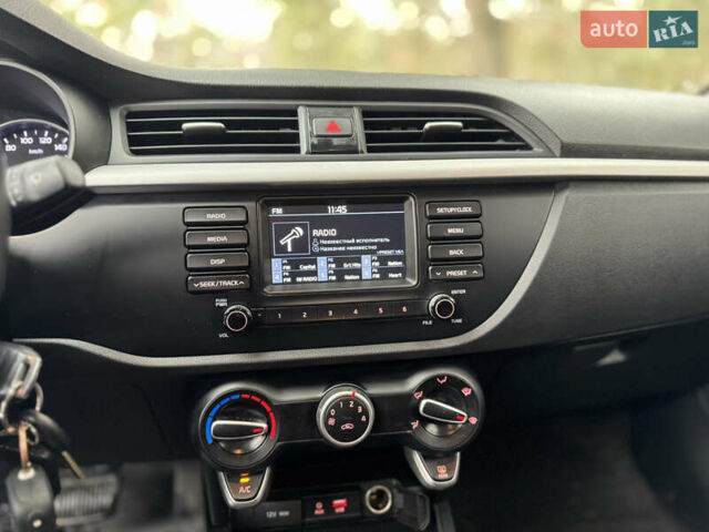 Чорний Кіа Ріо, об'ємом двигуна 1.4 л та пробігом 66 тис. км за 14200 $, фото 12 на Automoto.ua