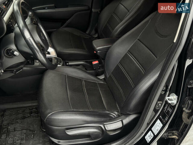 Чорний Кіа Ріо, об'ємом двигуна 1.4 л та пробігом 66 тис. км за 14200 $, фото 8 на Automoto.ua