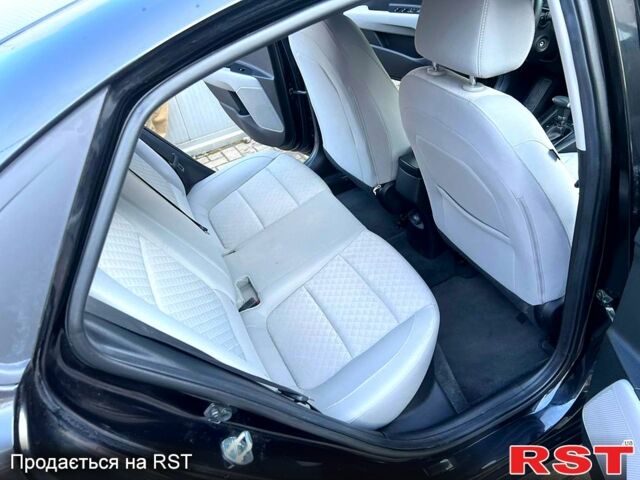 Черный Киа Рио, объемом двигателя 1.6 л и пробегом 10 тыс. км за 11500 $, фото 8 на Automoto.ua