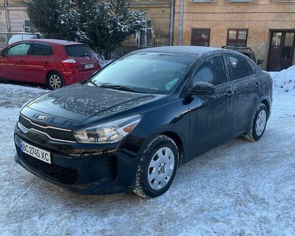 Черный Киа Рио, объемом двигателя 1.59 л и пробегом 9 тыс. км за 12700 $, фото 2 на Automoto.ua