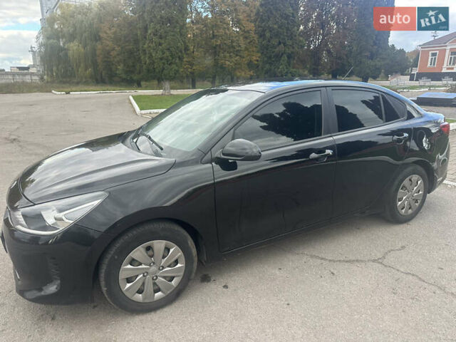 Чорний Кіа Ріо, об'ємом двигуна 1.6 л та пробігом 80 тис. км за 10500 $, фото 6 на Automoto.ua