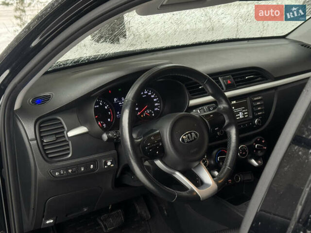 Чорний Кіа Ріо, об'ємом двигуна 1.4 л та пробігом 66 тис. км за 14200 $, фото 9 на Automoto.ua