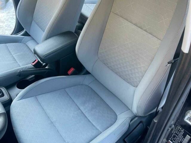 Чорний Кіа Ріо, об'ємом двигуна 1.6 л та пробігом 9 тис. км за 12700 $, фото 1 на Automoto.ua