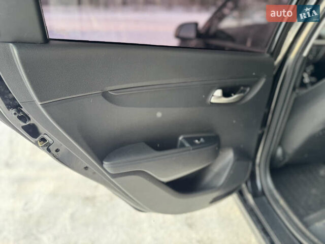 Чорний Кіа Ріо, об'ємом двигуна 1.37 л та пробігом 66 тис. км за 14300 $, фото 21 на Automoto.ua