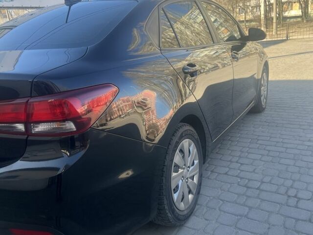 Чорний Кіа Ріо, об'ємом двигуна 1.6 л та пробігом 89 тис. км за 11400 $, фото 13 на Automoto.ua