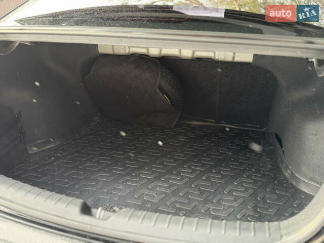 Чорний Кіа Ріо, об'ємом двигуна 1.37 л та пробігом 66 тис. км за 14500 $, фото 6 на Automoto.ua