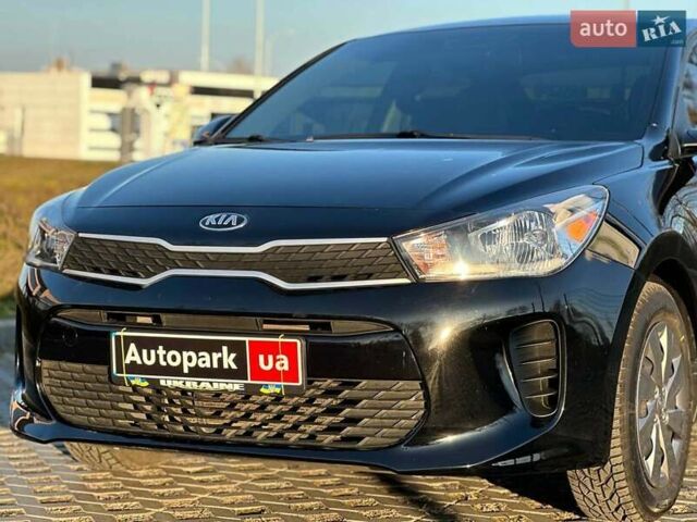 Чорний Кіа Ріо, об'ємом двигуна 1.6 л та пробігом 74 тис. км за 11790 $, фото 9 на Automoto.ua