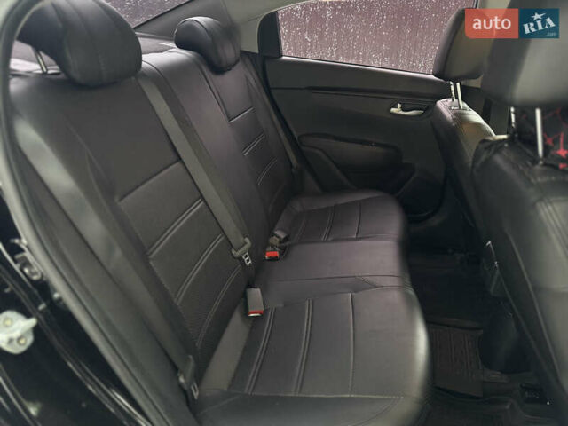 Чорний Кіа Ріо, об'ємом двигуна 1.4 л та пробігом 66 тис. км за 14200 $, фото 18 на Automoto.ua
