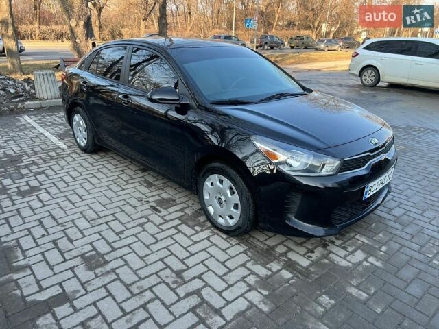 Чорний Кіа Ріо, об'ємом двигуна 1.59 л та пробігом 10 тис. км за 11200 $, фото 1 на Automoto.ua