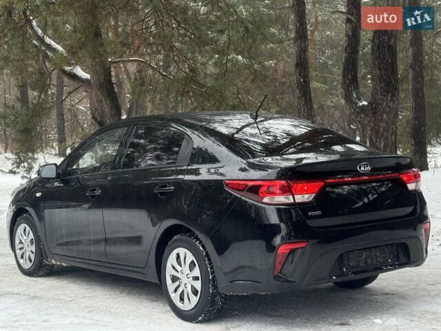 Чорний Кіа Ріо, об'ємом двигуна 1.4 л та пробігом 66 тис. км за 14200 $, фото 5 на Automoto.ua