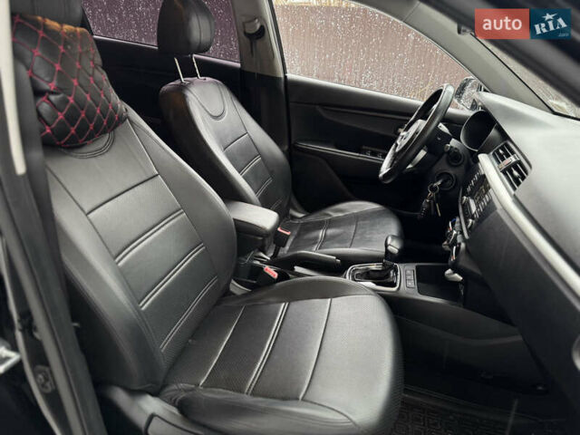 Чорний Кіа Ріо, об'ємом двигуна 1.4 л та пробігом 66 тис. км за 14200 $, фото 15 на Automoto.ua