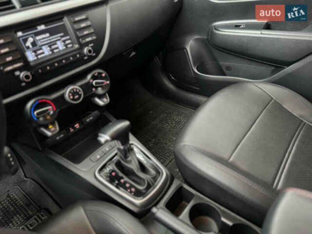 Чорний Кіа Ріо, об'ємом двигуна 1.4 л та пробігом 66 тис. км за 14200 $, фото 14 на Automoto.ua