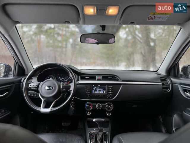 Чорний Кіа Ріо, об'ємом двигуна 1.4 л та пробігом 66 тис. км за 14200 $, фото 17 на Automoto.ua